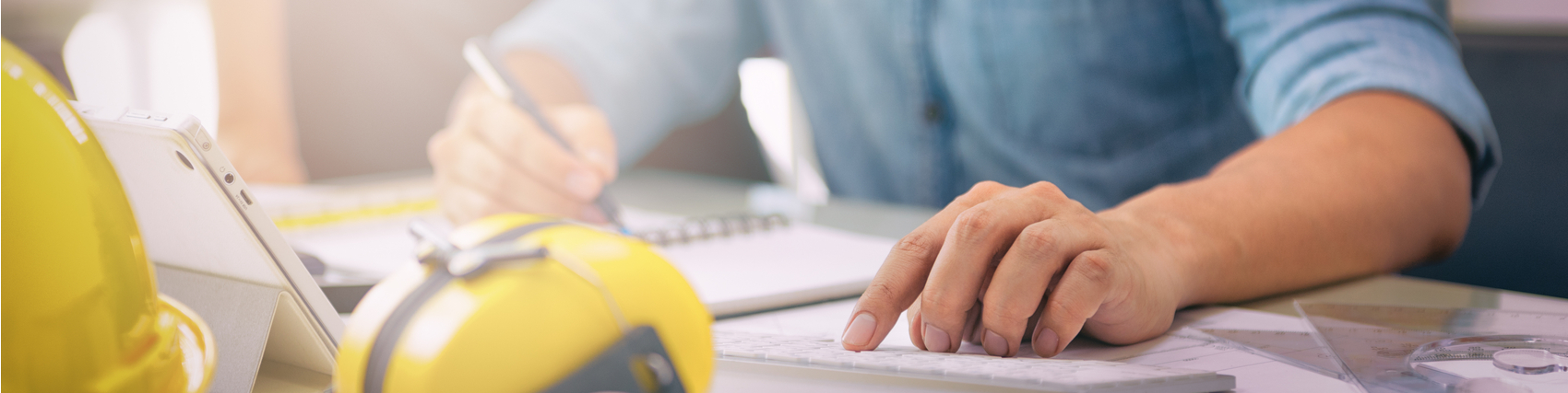 Engineer going over plans for a deck.