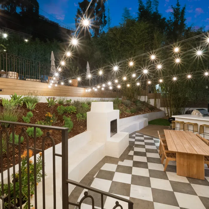 A hillside deck with black aluminum railing