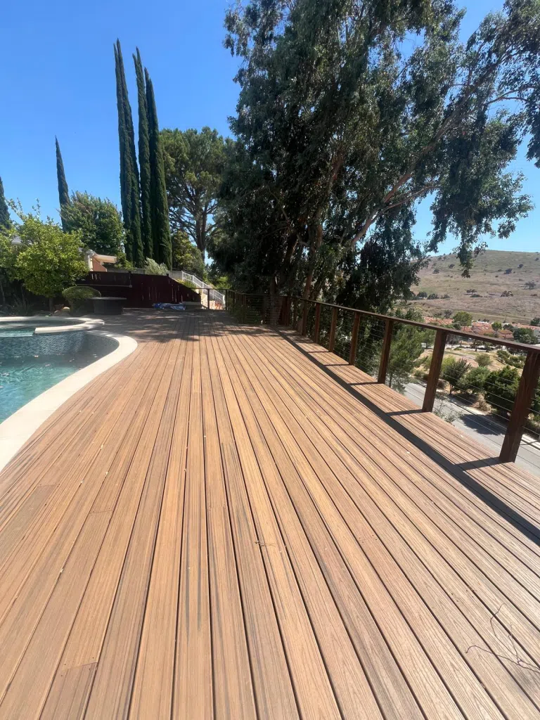A close-up of a new Trex deck in Cypress, California. The right fall deck maintenance will keep your deck looking as new as this one.