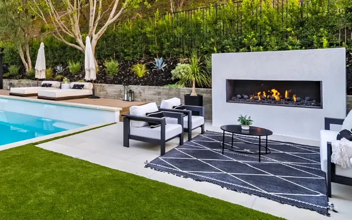 High quality pergola by MG Construction & Decks accentuating a recessed backyard deck